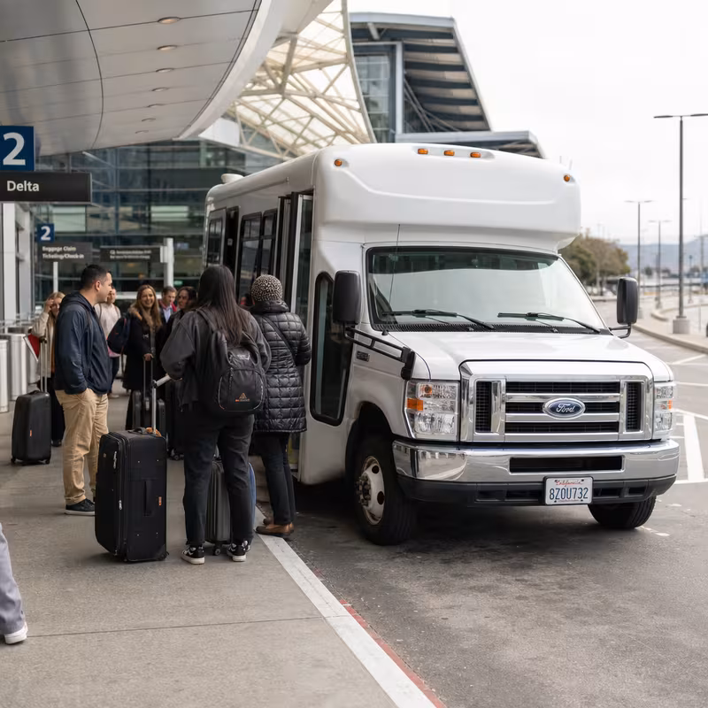 Black Mercedes Sprinter van staged for an Oakland Airport Transportation group