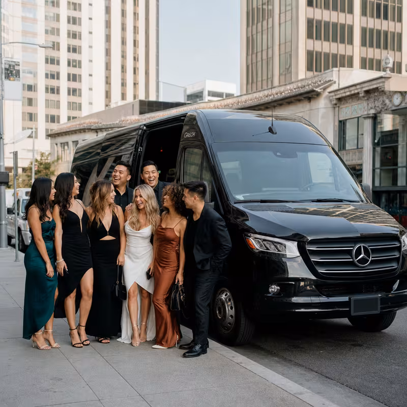 Group boarding a white charter bus for Bachelor & Bachelorette Transportation transportation in Oakland